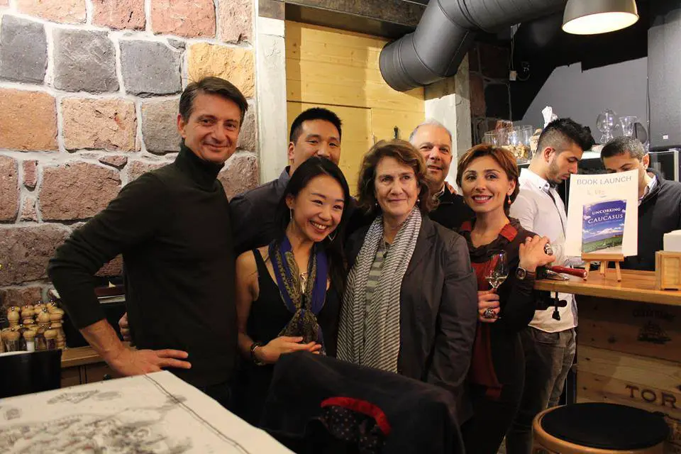 Us posing for a picture during a book signing at Wine Republic with the brains behind the Armenian Tree Project.