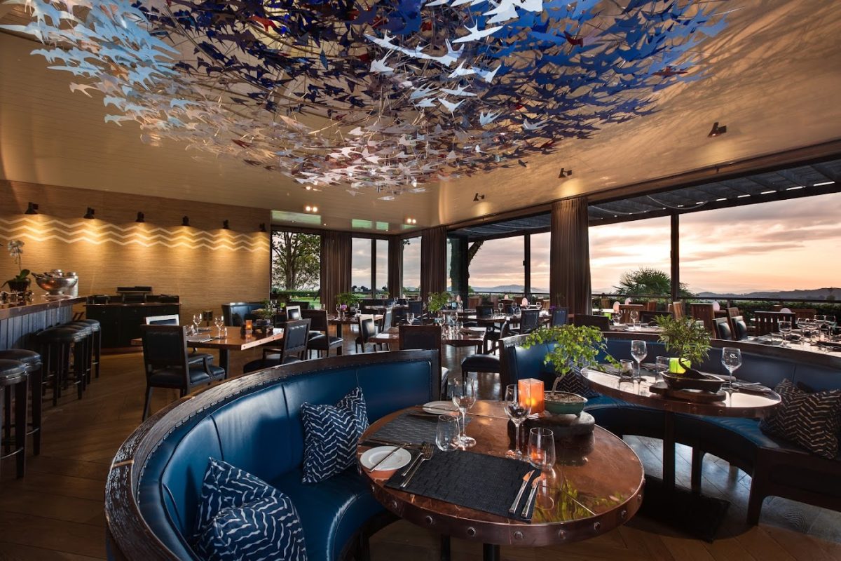 Image of indoor bar with panoramic view of the surroundings at Delaire Graff Estate