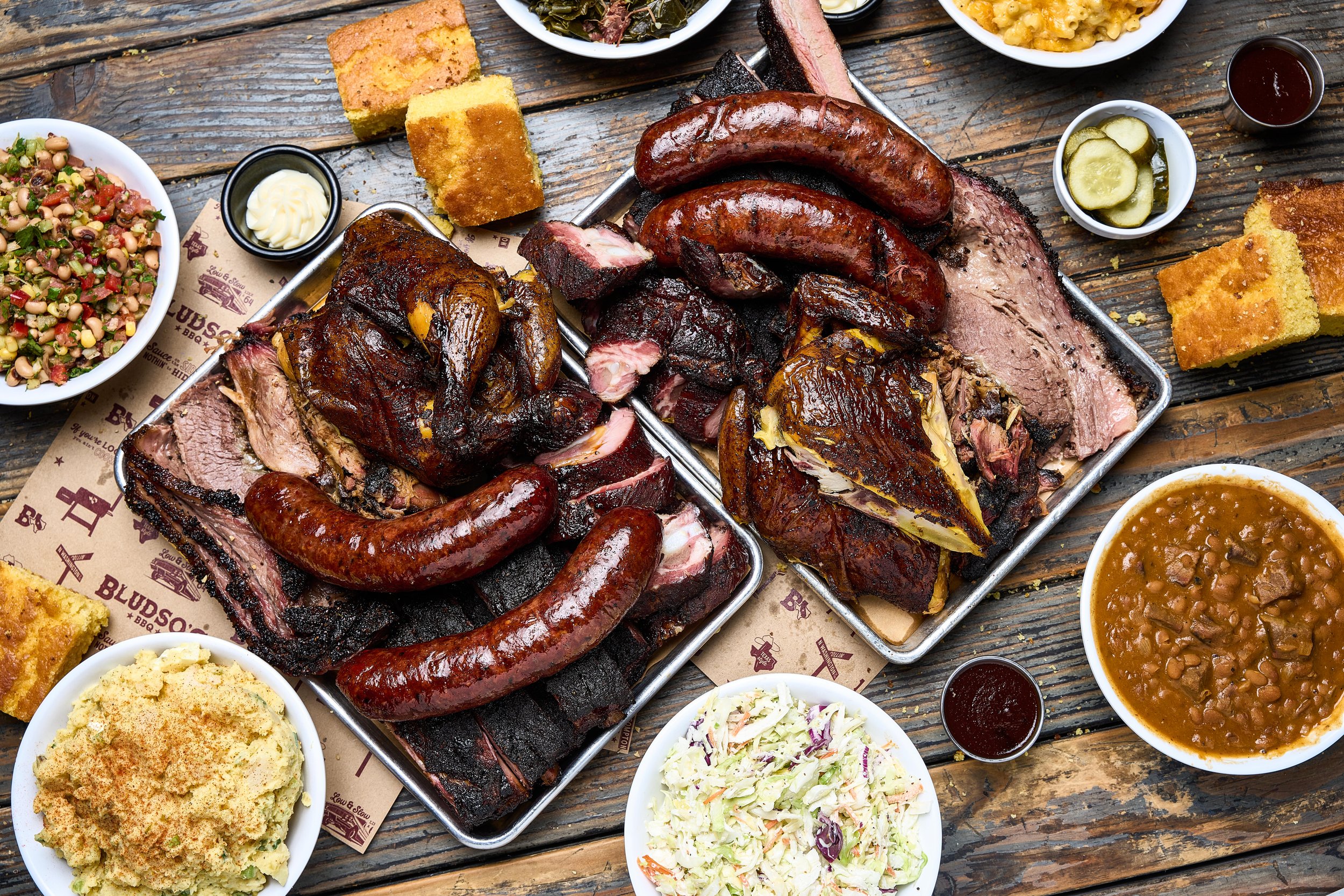 Image of various BBQ dishes at Bludso’s BBQ restaurant