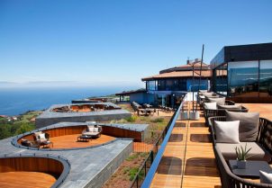 Image of an outdoor terrace with panoramic sea view at Akelarre restaurant