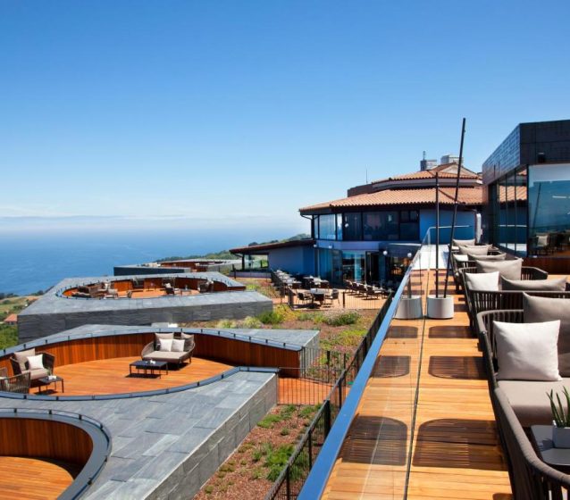 Image of an outdoor terrace with panoramic sea view at Akelarre restaurant