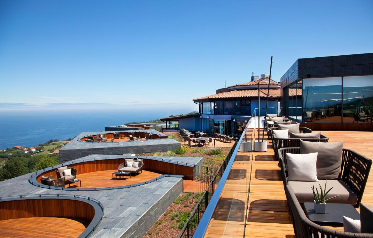 Image of an outdoor terrace with panoramic sea view at Akelarre restaurant