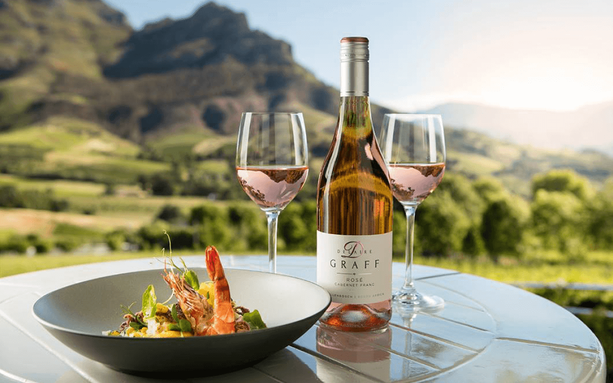 Image of a rose wine with food at Delaire Graff Wine Estate