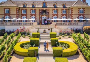 featured image of Domaine Carneros outdoor entrance surrounded with vineyards