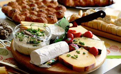 Cheese platter served on a wooden board